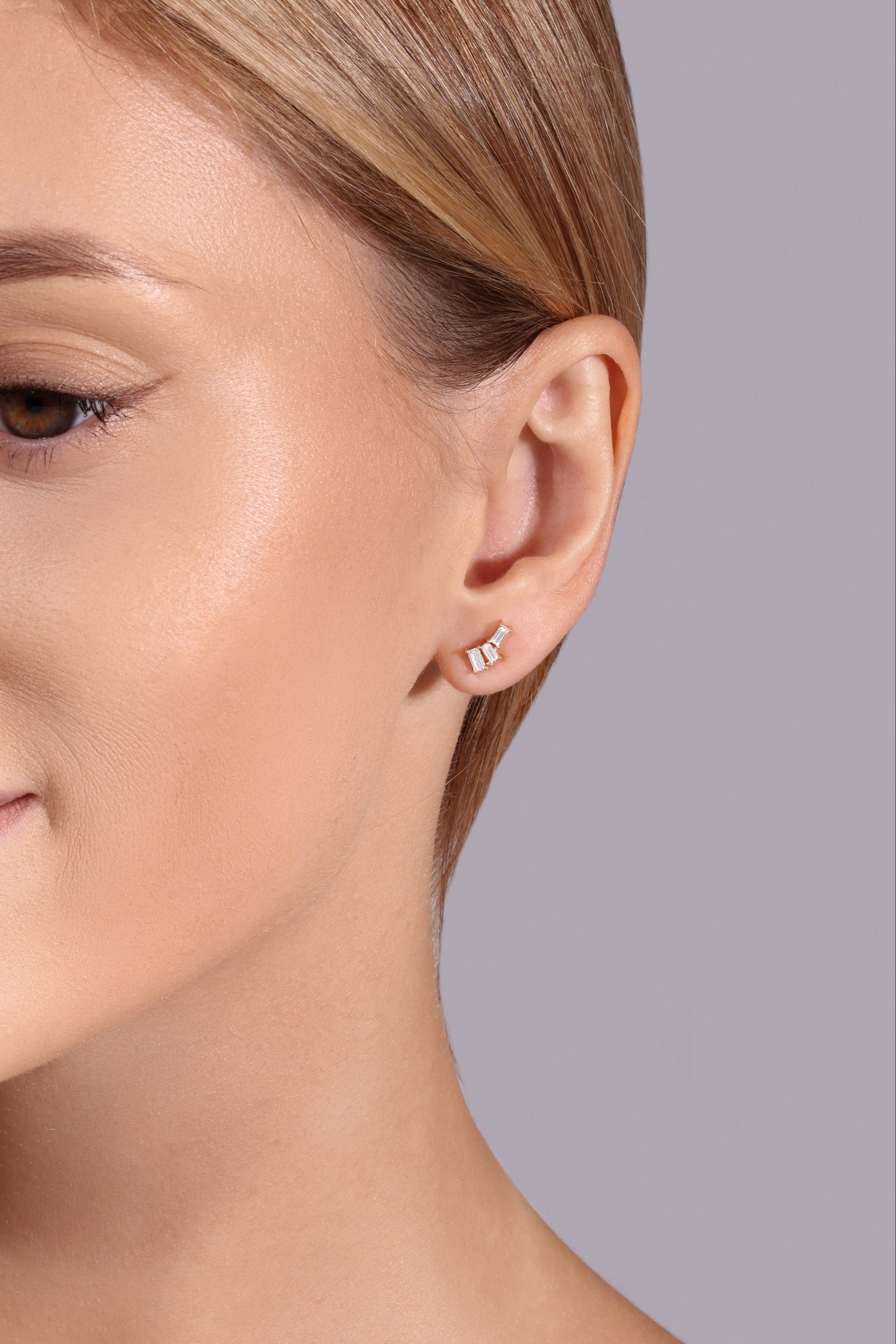 Small 14K gold baguette diamond stud earrings