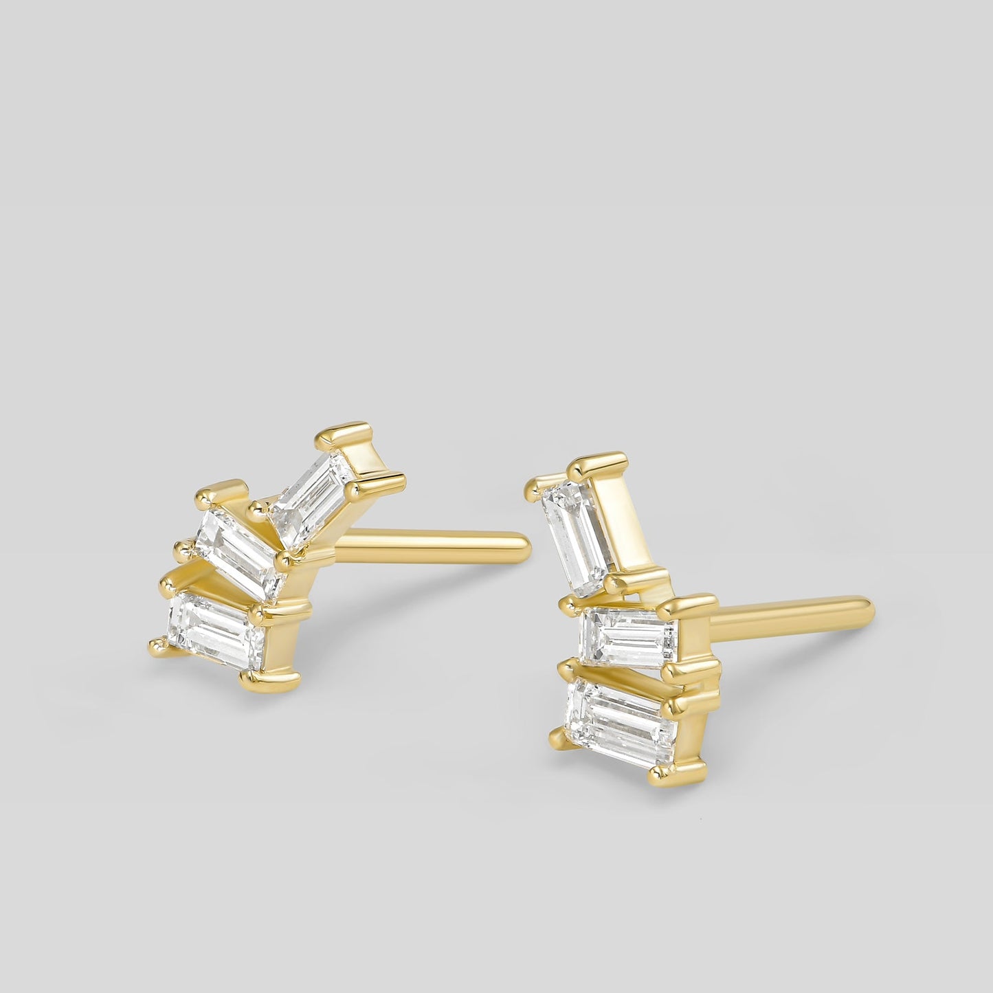 Small 14K gold baguette diamond stud earrings