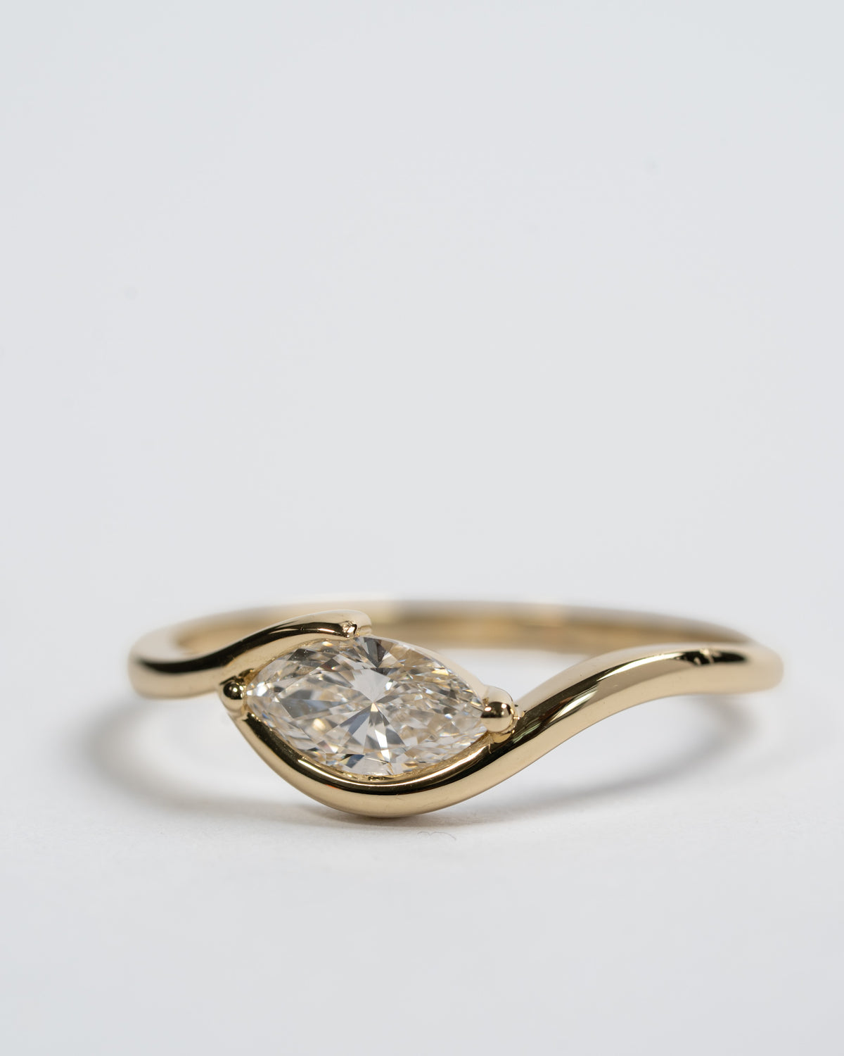 Motion In Between ring in 14K gold with a 1 ct lab grown marquise diamond