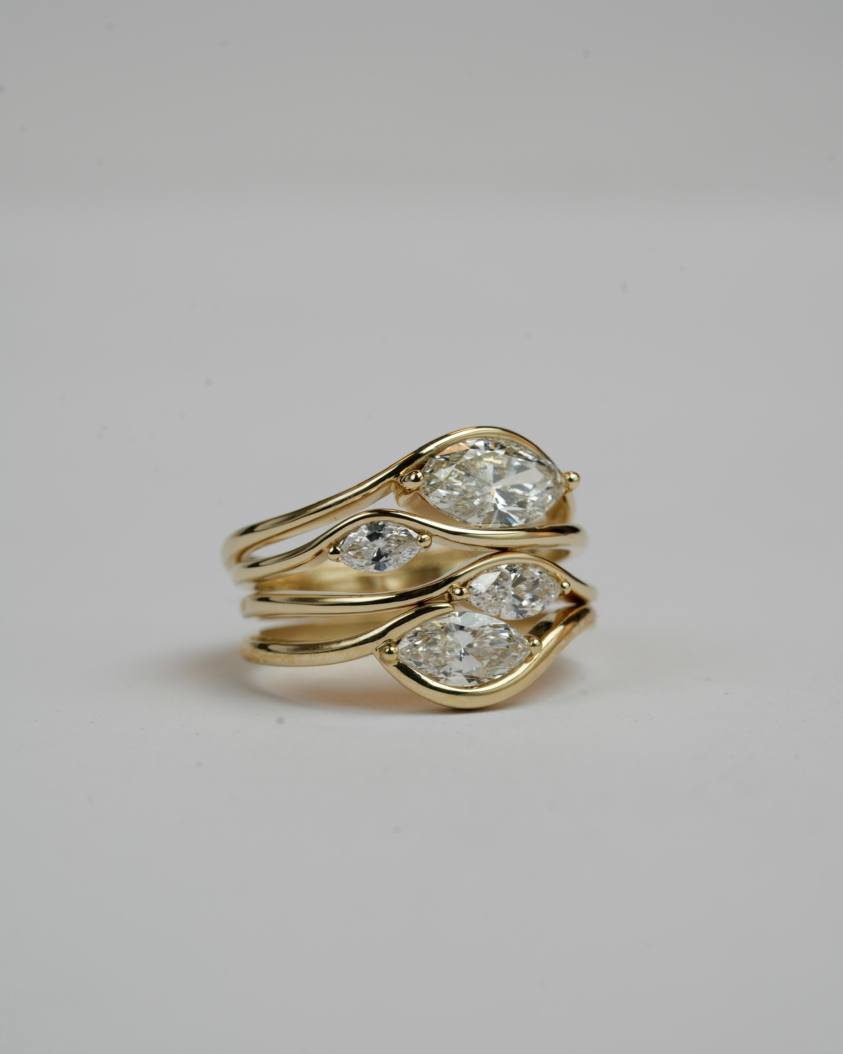 In between 1 carat lab diamond, in 14k gold.