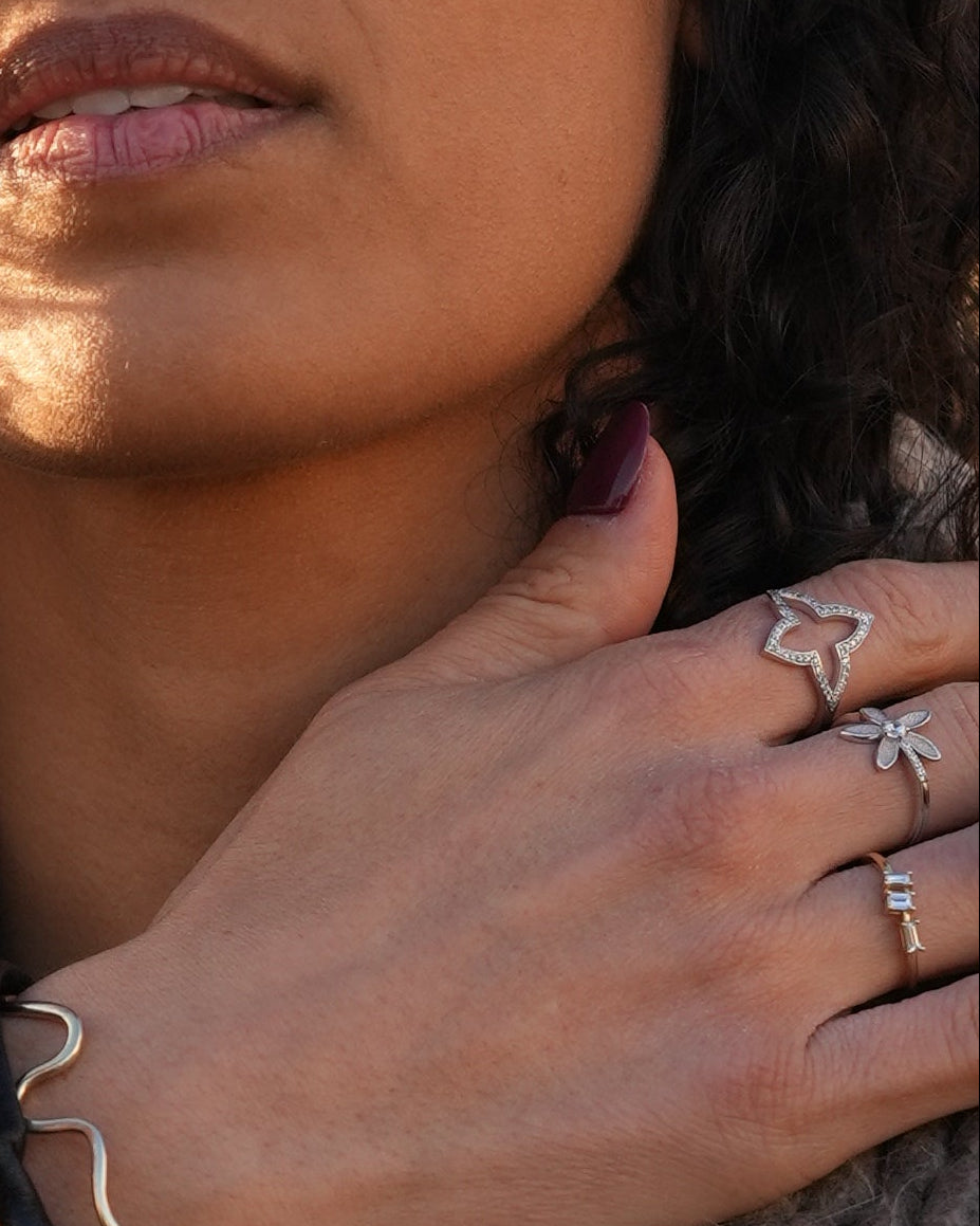 Two people lying on a textured surface with a blurred background