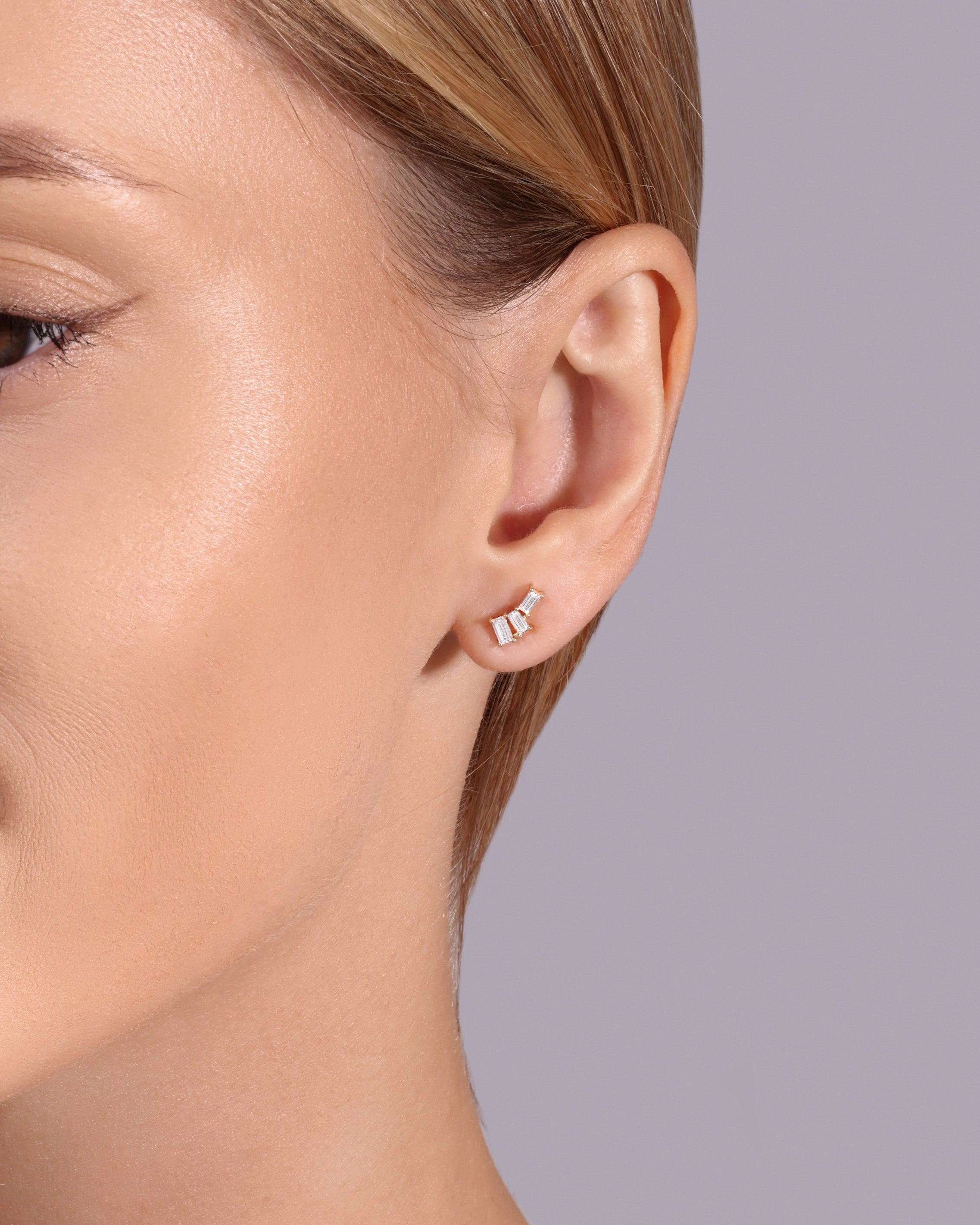 Small 14K gold baguette diamond stud earrings