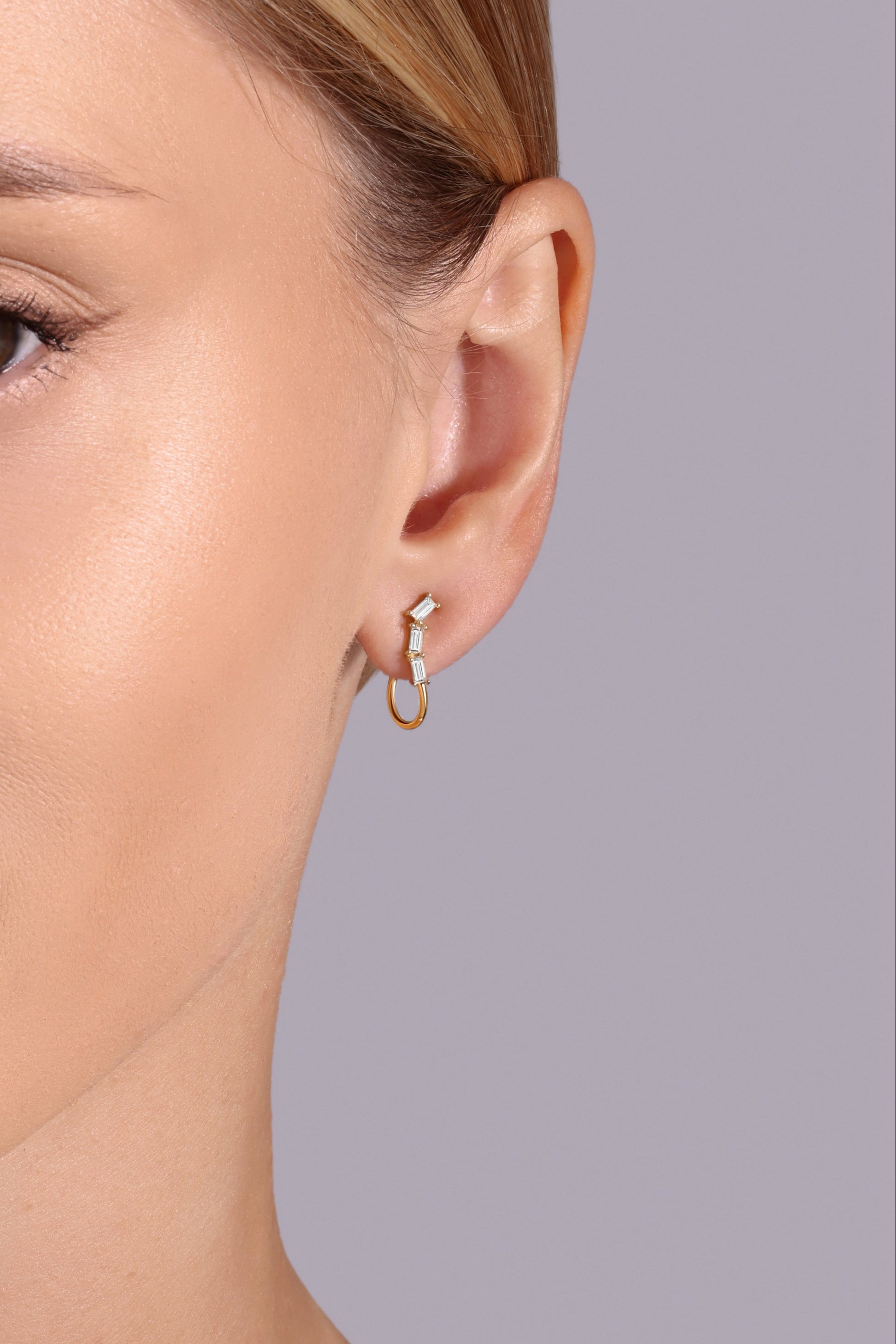 14K gold open hoop earrings with baguette diamonds