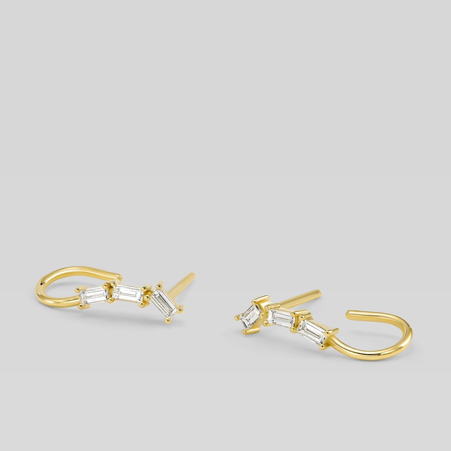 14K gold open hoop earrings with baguette diamonds