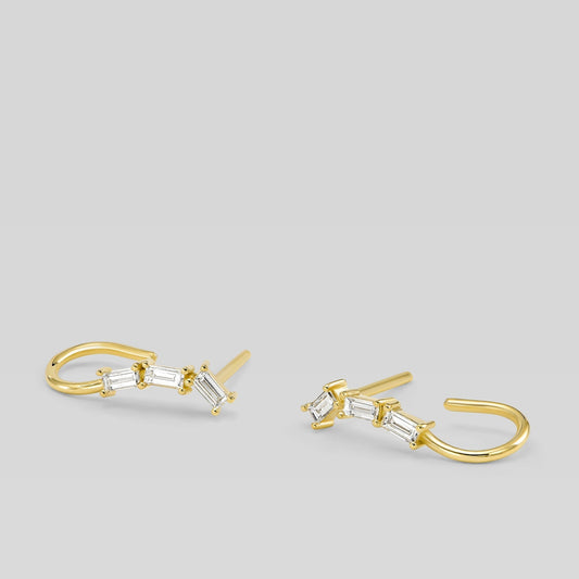 14K gold open hoop earrings with baguette diamonds