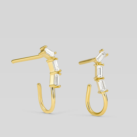 14K gold open hoop earrings with baguette diamonds