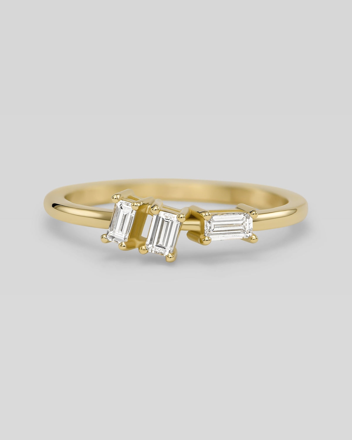 Tia ring in 14K gold with three natural baguette diamonds