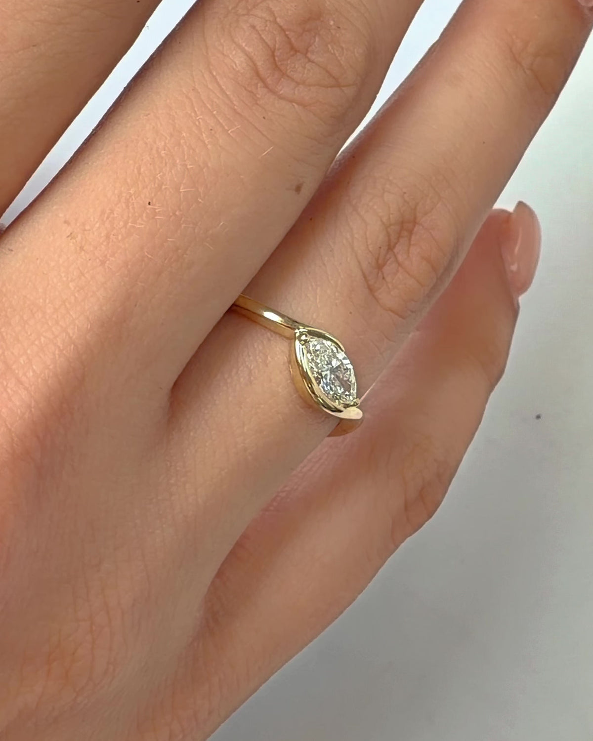 Motion In Between ring in 14K gold with a 1 ct lab grown marquise diamond, video