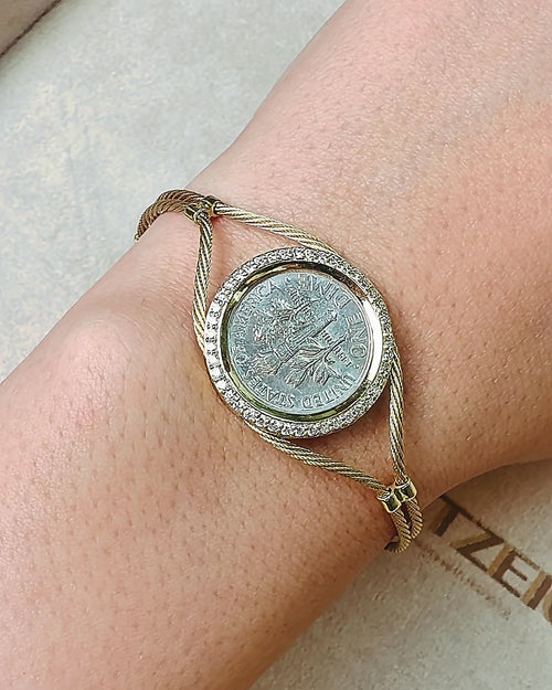 Coin bracelet, a coin framed in 14K gold and natural diamonds on a gold cable, video